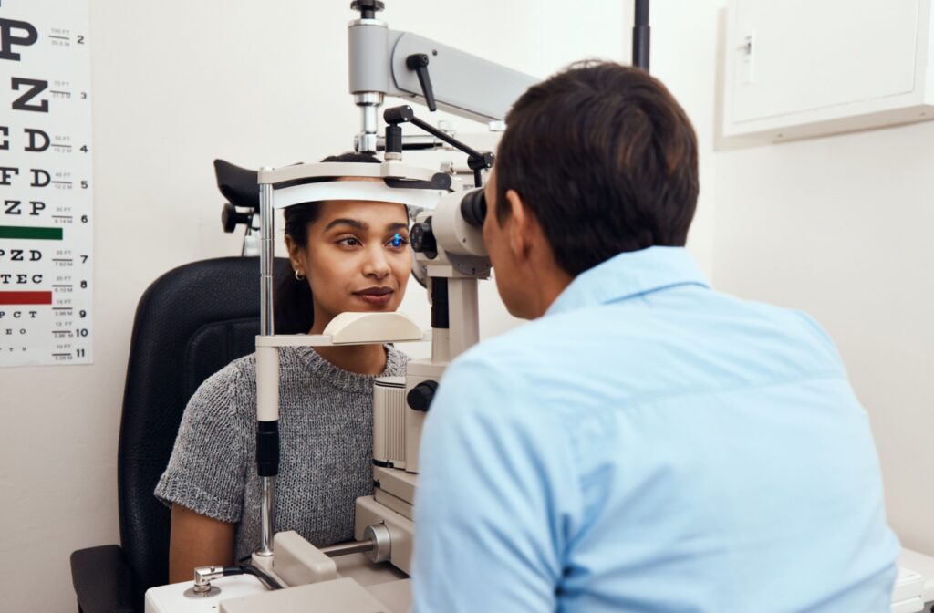 Optometrist performing a dry eye exam on a patient.