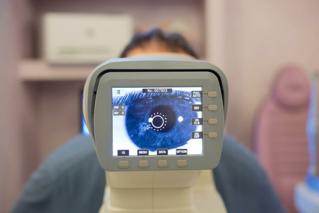 View of the optometrist's side of an autorefractor being used on a patient.